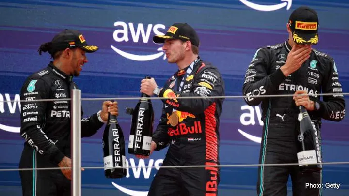BARCELONA, SPAIN - JUNE 04: Race Winner Max Verstappen of the Netherlands and Oracle Red Bull Racing, Second placed Lewis Hamilton of Great Britain and Mercedes and Third placed George Russell of Great Britain driving the (63) Mercedes AMG Petronas F1 Team W14 celebrate on the podium during the F1 Grand Prix of Spain at Circuit de Barcelona-Catalunya on June 04, 2023 in Barcelona, Spain. (Photo by Adam Pretty/Getty Images)