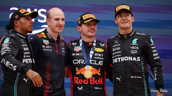 BARCELONA, SPAIN - JUNE 04: Race winner Max Verstappen of the Netherlands and Oracle Red Bull Racing (C) Second placed Lewis Hamilton of Great Britain and Mercedes (L) Third placed George Russell of Great Britain and Mercedes (R) and David Mart, Lead Powertrains Engineer at Red Bull Racing celebrate on the podium during the F1 Grand Prix of Spain at Circuit de Barcelona-Catalunya on June 04, 2023 in Barcelona, Spain. (Photo by Adam Pretty/Getty Images)