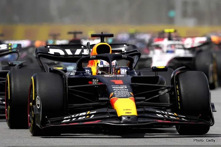 MONTREAL, QUEBEC - JUNE 18: Max Verstappen of the Netherlands driving the (1) Oracle Red Bull Racing RB19 leads Lewis Hamilton of Great Britain driving the (44) Mercedes AMG Petronas F1 Team W14 and the rest of the field at the start during the F1 Grand Prix of Canada at Circuit Gilles Villeneuve on June 18, 2023 in Montreal, Quebec. (Photo by Rudy Carezzevoli/Getty Images)