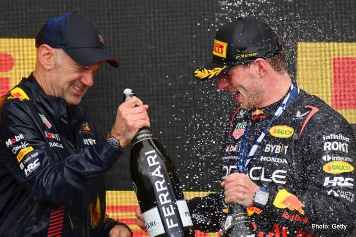 MONTREAL, QUEBEC - JUNE 18: Adrian Newey, the Chief Technical Officer of Red Bull Racing and First placed Max Verstappen of the Netherlands and Oracle Red Bull Racing celebrate on the podium during the F1 Grand Prix of Canada at Circuit Gilles Villeneuve on June 18, 2023 in Montreal, Quebec. (Photo by Clive Mason/Getty Images)