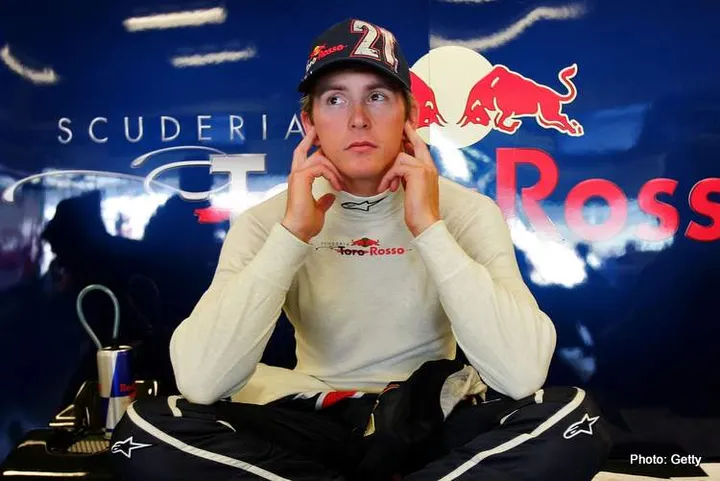 INDIANAPOLIS - JUNE 30: Scott Speed of the USA and Scuderia Toro Rosso looks on from the garage during practice for F1 United States Grand Prix at Indianapolis Motor Speedway on June 30, 2006 in Indianapolis, Indiana. (Photo by Mark Thompson/Getty Images)