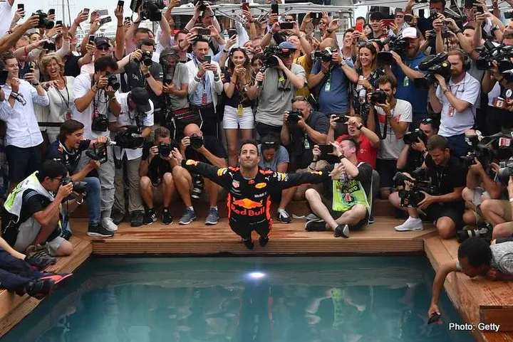 MONTE-CARLO, MONACO - MAY 27: Race winner Daniel Ricciardo of Australia and Red Bull Racing celebrates with his team on the Red Bull Energy Station during the Monaco Formula One Grand Prix at Circuit de Monaco on May 27, 2018 in Monte-Carlo, Monaco. (Photo by Dan Mullan/Getty Images)