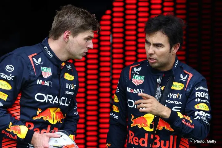 SPIELBERG, AUSTRIA - JULY 01: Sprint winner Max Verstappen of the Netherlands and Oracle Red Bull Racing and Second placed Sergio Perez of Mexico and Oracle Red Bull Racing talk in parc ferme during the Sprint ahead of the F1 Grand Prix of Austria at Red Bull Ring on July 01, 2023 in Spielberg, Austria. (Photo by Clive Rose/Getty Images)