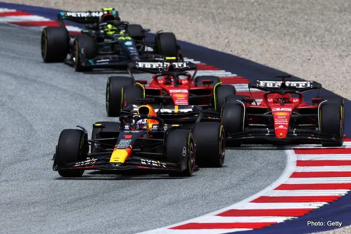 SPIELBERG, AUSTRIA - JULY 02: Max Verstappen of the Netherlands driving the (1) Oracle Red Bull Racing RB19 leads Charles Leclerc of Monaco driving the (16) Ferrari SF-23 and Carlos Sainz of Spain driving (55) the Ferrari SF-23 on track during the F1 Grand Prix of Austria at Red Bull Ring on July 02, 2023 in Spielberg, Austria. (Photo by Lars Baron/Getty Images)