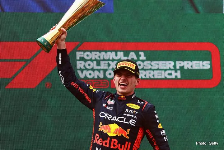 SPIELBERG, AUSTRIA - JULY 02: Race winner Max Verstappen of the Netherlands and Oracle Red Bull Racing celebrates on the podium during the F1 Grand Prix of Austria at Red Bull Ring on July 02, 2023 in Spielberg, Austria. (Photo by Clive Rose/Getty Images)