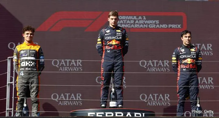 BUDAPEST, HUNGARY - JULY 23: Race winner Max Verstappen of the Netherlands and Oracle Red Bull Racing, Second placed Lando Norris of Great Britain and McLaren and Third placed Sergio Perez of Mexico and Oracle Red Bull Racing celebrate on the podium during the F1 Grand Prix of Hungary at Hungaroring on July 23, 2023 in Budapest, Hungary. (Photo by Francois Nel/Getty Images)