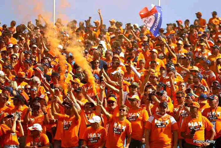 ZANDVOORT, NETHERLANDS - SEPTEMBER 05: Max Verstappen of Netherlands and Red Bull Racing fans show their support ahead of the F1 Grand Prix of The Netherlands at Circuit Zandvoort on September 05, 2021 in Zandvoort, Netherlands. (Photo by Bryn Lennon/Getty Images) dutch gp