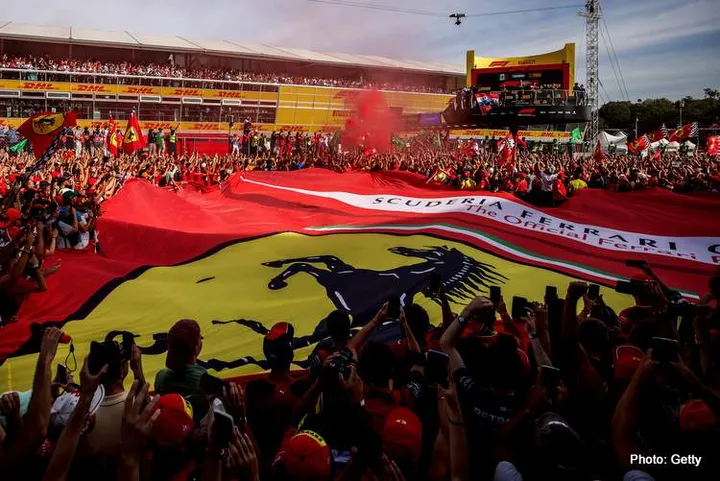 MONZA, ITALY - SEPTEMBER 03: A general view as the Tifosi celebrate during the podium celebrations with Race winner Max Verstappen of the Netherlands and Oracle Red Bull Racing, Second placed Sergio Perez of Mexico and Oracle Red Bull Racing and Third placed Carlos Sainz of Spain and Ferrari during the F1 Grand Prix of Italy at Autodromo Nazionale Monza on September 03, 2023 in Monza, Italy. (Photo by Ryan Pierse/Getty Images) // Getty Images / Red Bull Content Pool // SI202309030438 // Usage for editorial use only //