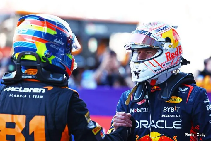 SUZUKA, JAPAN - SEPTEMBER 23: Pole position qualifier Max Verstappen of the Netherlands and Oracle Red Bull Racing and Second placed qualifier Oscar Piastri of Australia and McLaren celebrates in parc ferme during qualifying ahead of the F1 Grand Prix of Japan at Suzuka International Racing Course on September 23, 2023 in Suzuka, Japan. (Photo by Mark Thompson/Getty Images) // Getty Images / Red Bull Content Pool // SI202309230176 // Usage for editorial use only //