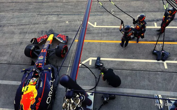 SUZUKA, JAPAN - SEPTEMBER 24: Sergio Perez of Mexico driving the (11) Oracle Red Bull Racing RB19 leaves the garage to return to the race during the F1 Grand Prix of Japan at Suzuka International Racing Course on September 24, 2023 in Suzuka, Japan. (Photo by Mark Thompson/Getty Images) // Getty Images / Red Bull Content Pool // SI202309240128 // Usage for editorial use only //