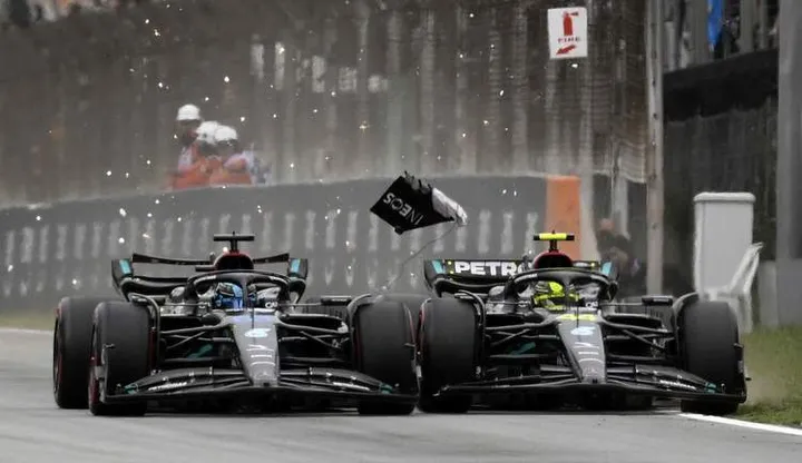 Mercedes' British driver George Russell (L) and Mercedes' British driver Lewis Hamilton compete during the qualifying session for the Spanish Formula One Grand Prix at the Circuit de Catalunya on June 3, 2023 in Montmelo, on the outskirts of Barcelona. (Photo by Josep LAGO / AFP)