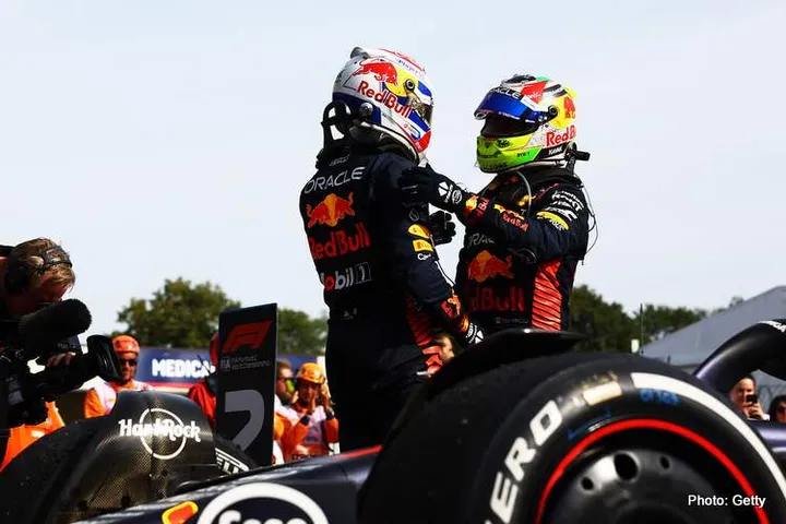 MONZA, ITALY - SEPTEMBER 03: Race winner Max Verstappen of the Netherlands and Oracle Red Bull Racing and Second placed Sergio Perez of Mexico and Oracle Red Bull Racing celebrate in parc ferme during the F1 Grand Prix of Italy at Autodromo Nazionale Monza on September 03, 2023 in Monza, Italy. (Photo by Mark Thompson/Getty Images)