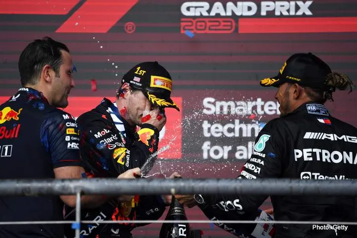 AUSTIN, TEXAS - OCTOBER 22: Race winner Max Verstappen of the Netherlands and Oracle Red Bull Racing celebrates on the podium following the F1 Grand Prix of United States at Circuit of The Americas on October 22, 2023 in Austin, Texas. (Photo by Rudy Carezzevoli/Getty Images)