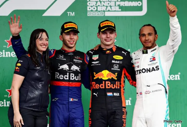 SAO PAULO, BRAZIL - NOVEMBER 17: Top three finishers Max Verstappen of Netherlands and Red Bull Racing, Pierre Gasly of France and Scuderia Toro Rosso and Lewis Hamilton of Great Britain and Mercedes GP celebrate on the podium during the F1 Grand Prix of Brazil at Autodromo Jose Carlos Pace on November 17, 2019 in Sao Paulo, Brazil. (Photo by Mark Thompson/Getty Images) // Getty Images / Red Bull Content Pool // AP-227DM8Q1W2111 // Usage for editorial use only //