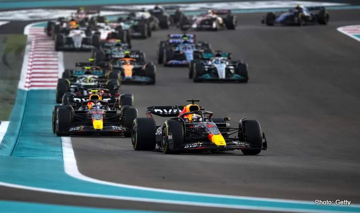 ABU DHABI, UNITED ARAB EMIRATES - NOVEMBER 20: Max Verstappen of the Netherlands driving the (1) Oracle Red Bull Racing RB18 leads Sergio Perez of Mexico driving the (11) Oracle Red Bull Racing RB18 on track during the 2023 Formula 1: Records and milestones, more than 40 of them! Grand Prix of Abu Dhabi at Yas Marina Circuit on November 20, 2022 in Abu Dhabi, United Arab Emirates. (Photo by Rudy Carezzevoli/Getty Images)