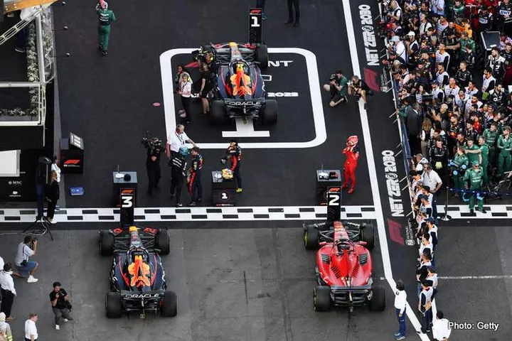 BAKU, AZERBAIJAN - APRIL 29: Sprint winner Sergio Perez of Mexico and Oracle Red Bull Racing, Second placed Charles Leclerc of Monaco and Ferrari and Third placed Max Verstappen of the Netherlands and Oracle Red Bull Racing pose celebrate in parc ferme during the Sprint ahead of the F1 Grand Prix of Azerbaijan at Baku City Circuit on April 29, 2023 in Baku, Azerbaijan. (Photo by Rudy Carezzevoli/Getty Images)
