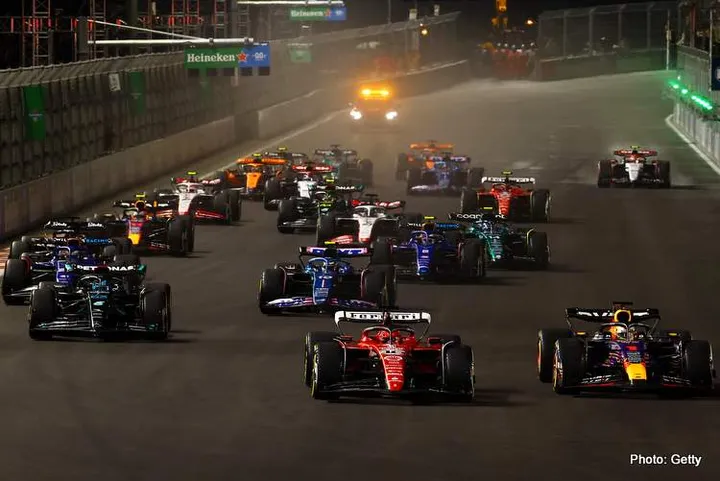 LAS VEGAS, NEVADA - NOVEMBER 18: Max Verstappen of the Netherlands driving the (1) Oracle Red Bull Racing RB19 leads Charles Leclerc of Monaco driving the (16) Ferrari SF-23 at turn one during the F1 Grand Prix of Las Vegas at Las Vegas Strip Circuit on November 18, 2023 in Las Vegas, Nevada. (Photo by Mark Thompson/Getty Images)