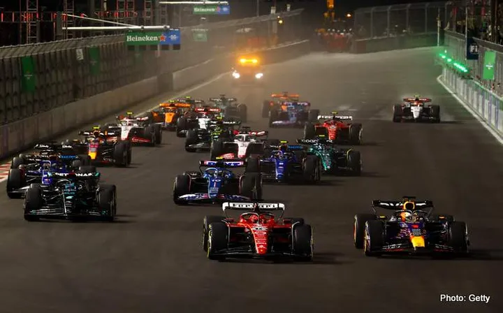 LAS VEGAS, NEVADA - NOVEMBER 18: Max Verstappen of the Netherlands driving the (1) Oracle Red Bull Racing RB19 leads Charles Leclerc of Monaco driving the (16) Ferrari SF-23 at turn one during the F1 Grand Prix of Las Vegas at Las Vegas Strip Circuit on November 18, 2023 in Las Vegas, Nevada. (Photo by Mark Thompson/Getty Images)