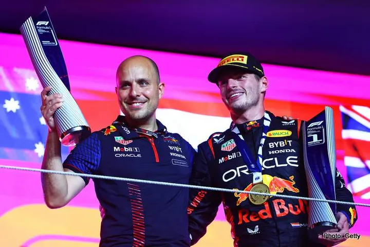 LUSAIL CITY, QATAR - OCTOBER 08: Race winner Max Verstappen of the Netherlands and Oracle Red Bull Racing and race engineer Gianpiero Lambiase celebrate on the podium during the F1 Grand Prix of Qatar at Lusail International Circuit on October 08, 2023 in Lusail City, Qatar. (Photo by Mark Thompson/Getty Images)