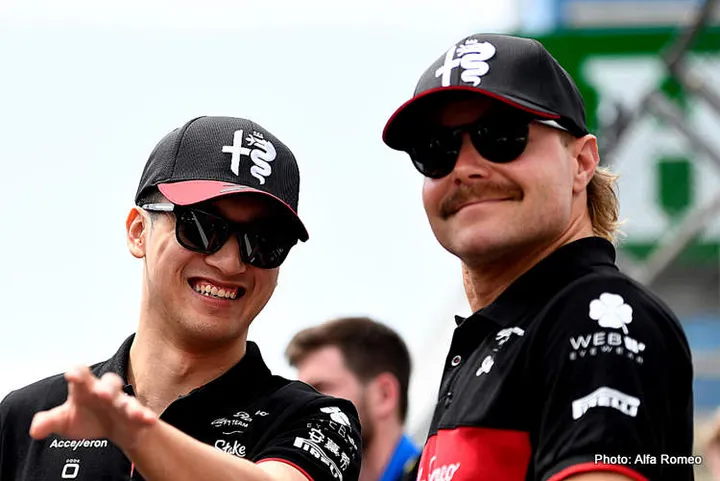 zhou and bottas f1 alfa romeo