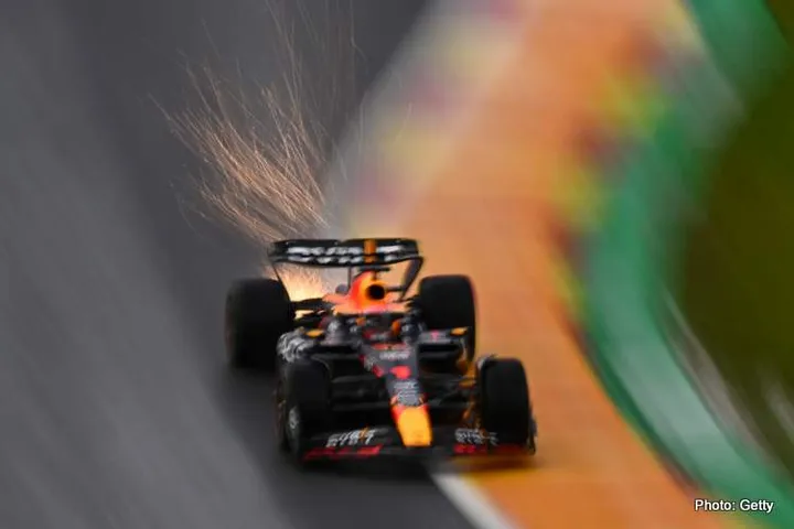 SPA, BELGIUM - JULY 28: Sparks fly behind Max Verstappen of the Netherlands driving the (1) Oracle Red Bull Racing RB19 during qualifying ahead of the F1 Grand Prix of Belgium at Circuit de Spa-Francorchamps on July 28, 2023 in Spa, Belgium. (Photo by Dan Mullan/Getty Images)
