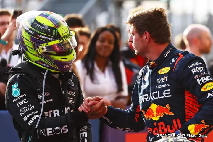 AUSTIN, TEXAS - OCTOBER 21: Sprint winner Max Verstappen of the Netherlands and Oracle Red Bull Racing shakes hands with Second placed Lewis Hamilton of Great Britain and Mercedes in parc ferme after the Sprint ahead of the F1 Grand Prix of United States at Circuit of The Americas on October 21, 2023 in Austin, Texas. (Photo by Mark Thompson/Getty Images)