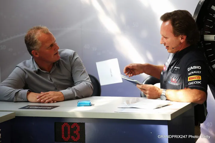 MONZA, ITALY - SEPTEMBER 06: Red Bull Racing Team Principal Christian Horner competes with team mate Johnny Herbert in a Casio game show during previews to the Italian Formula One Grand Prix at the Autodromo Nazionale di Monza on September 6, 2012 in Monza, Italy. (Photo by Mark Thompson/Getty Images) // Getty Images / Red Bull Content Pool // SI201412169417 // Usage for editorial use only //
