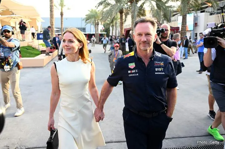 BAHRAIN, BAHRAIN - MARCH 02: Oracle Red Bull Racing Team Principal Christian Horner and Geri Horner walk in the Paddock holding hands prior to the F1 Grand Prix of Bahrain at Bahrain International Circuit on March 02, 2024 in Bahrain, Bahrain. (Photo by Clive Mason/Getty Images)