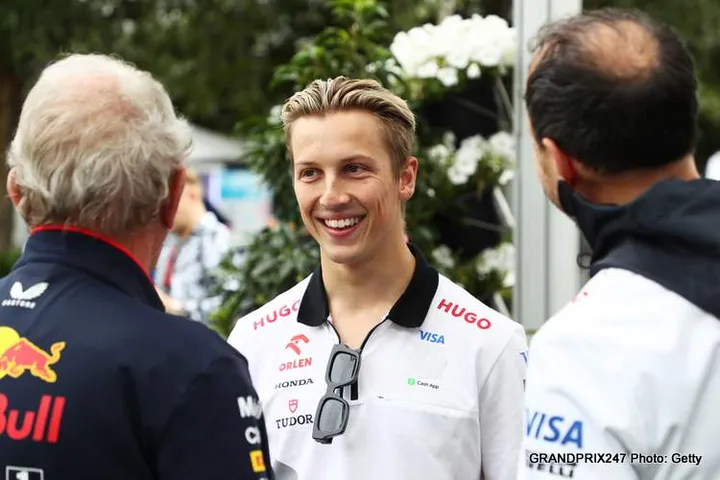 MELBOURNE, AUSTRALIA - MARCH 24: Peter Bayer, CEO of Visa Cash App RB, Oracle Red Bull Racing Team Consultant Dr Helmut Marko and Liam Lawson of New Zealand and Visa Cash App RB talk in the Paddock prior to the F1 Grand Prix of Australia at Albert Park Circuit on March 24, 2024 in Melbourne, Australia. (Photo by Peter Fox/Getty Images)