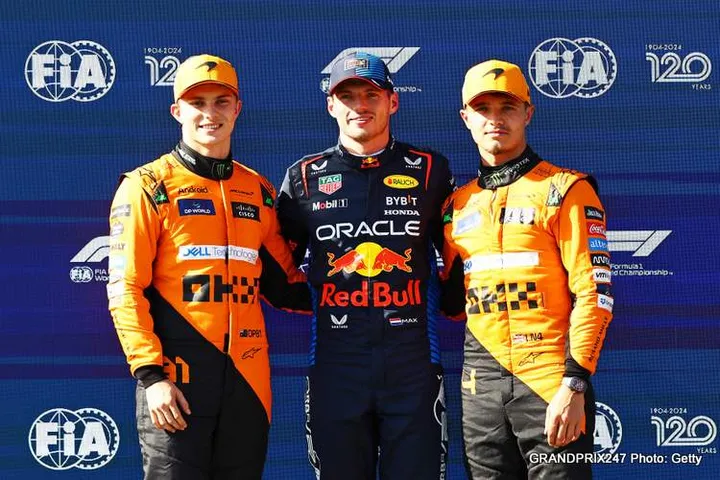 IMOLA, ITALY - MAY 18: Pole position qualifier Max Verstappen of the Netherlands and Oracle Red Bull Racing, Second placed qualifier Oscar Piastri of Australia and McLaren and Third placed qualifier Lando Norris of Great Britain and McLaren pose for a photo in parc ferme during qualifying ahead of the F1 Grand Prix of Emilia-Romagna at Autodromo Enzo e Dino Ferrari Circuit on May 18, 2024 in Imola, Italy. (Photo by Mark Thompson/Getty Images)