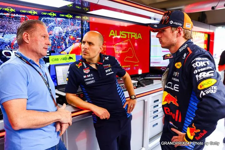 SPIELBERG, AUSTRIA - JUNE 27: Max Verstappen of the Netherlands and Oracle Red Bull Racing, race engineer Gianpiero Lambiase and Jos Verstappen talk in the garage during previews ahead of the F1 Grand Prix of Austria at Red Bull Ring on June 27, 2024 in Spielberg, Austria. (Photo by Mark Thompson/Getty Images)