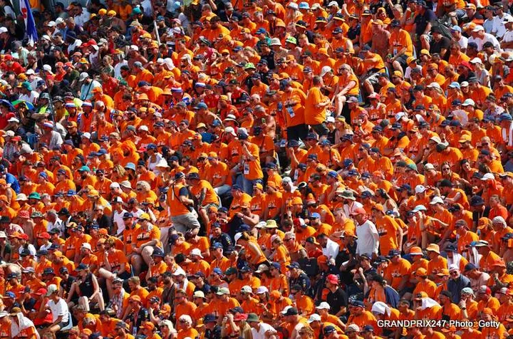 BUDAPEST, HUNGARY - JULY 21: Max Verstappen of the Netherlands and Oracle Red Bull Racing fans show their support during the F1 Grand Prix of Hungary at Hungaroring on July 21, 2024 in Budapest, Hungary. (Photo by Mark Thompson/Getty Images)