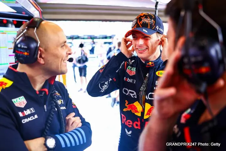 SPA, BELGIUM - JULY 26: Max Verstappen of the Netherlands and Oracle Red Bull Racing talks with race engineer Gianpiero Lambiase in the garage prior to practice ahead of the F1 Grand Prix of Belgium at Circuit de Spa-Francorchamps on July 26, 2024 in Spa, Belgium. (Photo by Mark Thompson/Getty Images)