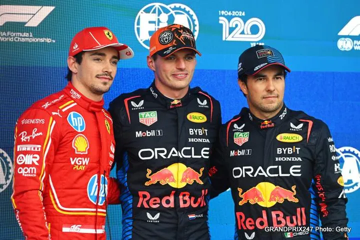 SPA, BELGIUM - JULY 27: Pole position qualifier Max Verstappen of the Netherlands and Oracle Red Bull Racing, Second placed qualifier Charles Leclerc of Monaco and Ferrari and Third placed qualifier Sergio Perez of Mexico and Oracle Red Bull Racing talk in parc ferme during qualifying ahead of the F1 Grand Prix of Belgium at Circuit de Spa-Francorchamps on July 27, 2024 in Spa, Belgium. (Photo by Rudy Carezzevoli/Getty Images)