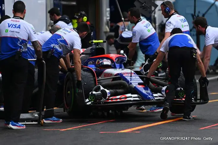 SPA, BELGIUM - JULY 27: Yuki Tsunoda of Japan driving the (22) Visa Cash App RB VCARB 01 is pushed back into the garage during qualifying ahead of the F1 Grand Prix of Belgium at Circuit de Spa-Francorchamps on July 27, 2024 in Spa, Belgium. (Photo by Rudy Carezzevoli/Getty Images)