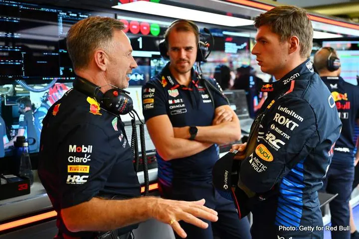 BAKU, AZERBAIJAN - SEPTEMBER 13: Max Verstappen of the Netherlands and Oracle Red Bull Racing talks with Oracle Red Bull Racing Team Principal Christian Horner in the garage during practice ahead of the F1 Grand Prix of Azerbaijan at Baku City Circuit on September 13, 2024 in Baku, Azerbaijan. (Photo by Dan Mullan/Getty Images)