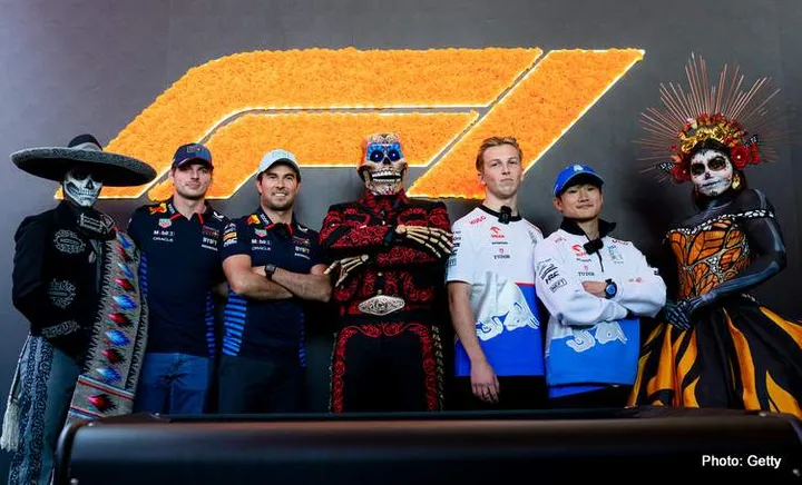 MEXICO CITY, MEXICO - OCTOBER 24: Max Verstappen of the Netherlands and Oracle Red Bull Racing, Sergio Perez of Mexico and Oracle Red Bull Racing, Liam Lawson of New Zealand and Visa Cash App RB and Yuki Tsunoda of Japan and Visa Cash App RB pose for a photo with Day of the Dead performers in the Paddock during previews ahead of the F1 Grand Prix of Mexico at Autodromo Hermanos Rodriguez on October 24, 2024 in Mexico City, Mexico. (Photo by Rudy Carezzevoli/Getty Images) // Getty Images / Red Bull Content Pool // SI202410240526 // Usage for editorial use only //