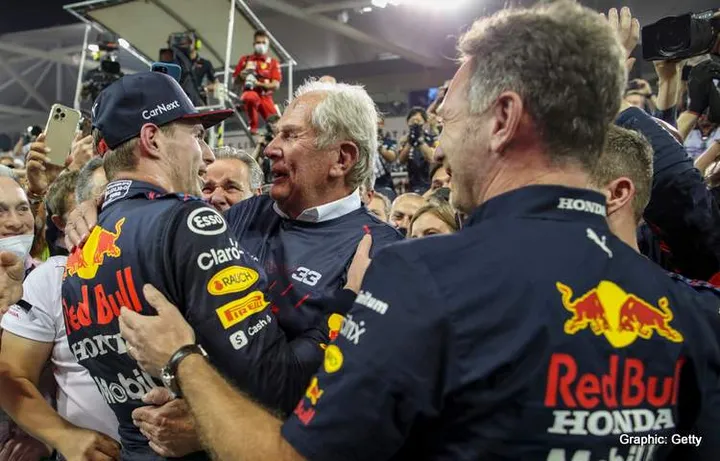 # 33 Max Verstappen (NED, Red Bull Racing) celebrates becoming the 2021 Drivers World Champion with Dr. Helmut Marko (AUT, Red Bull Racing), Christian Horner (GBR, Red Bull Racing), F1 Grand Prix of Abu Dhabi at Yas Marina Circuit on December 12, 2021 in Abu Dhabi, United Arab Emirates. (Photo by HOCH ZWEI)