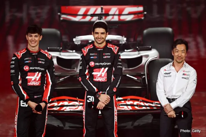 LONDON, ENGLAND - FEBRUARY 18: Oliver Bearman of Great Britain and Haas F1 Esteban Ocon of France and Haas F1 Ayao Komatsu, Team Principal of Haas F1 with the team livery presentation during F1 75 Live at The O2 Arena on February 18, 2025 in London, England. (Photo by Clive Mason - Formula 1/Formula 1 via Getty Images)