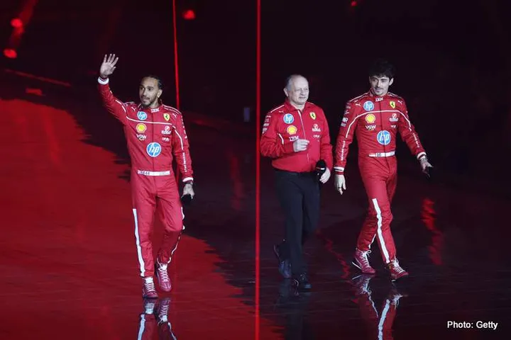 LONDON, ENGLAND - FEBRUARY 18: Lewis Hamilton of Great Britain and Scuderia Ferrari waves to the crowd as he takes to the stage with Frederic Vasseur, Team Principal of Scuderia Ferrari and Charles Leclerc of Monaco and Scuderia Ferrari during F1 75 Live at The O2 Arena on February 18, 2025 in London, England. (Photo by Clive Rose - Formula 1/Formula 1 via Getty Images)