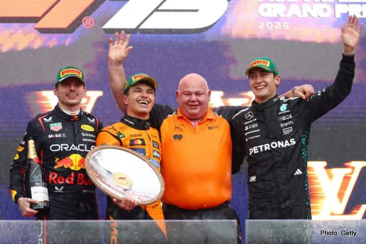 MELBOURNE, AUSTRALIA - MARCH 16: Second placed Max Verstappen of the Netherlands and Oracle Red Bull Racing Race winner Lando Norris of Great Britain and McLaren Rob Marshall, Chief Designer of McLaren and Third placed George Russell of Great Britain and Mercedes AMG Petronas F1 Team on the podium during the F1 Grand Prix of Australia at Albert Park Grand Prix Circuit on March 16, 2025 in Melbourne, Australia. (Photo by Clive Rose/Getty Images) // Getty Images / Red Bull Content Pool // SI202503160120 // Usage for editorial use only //