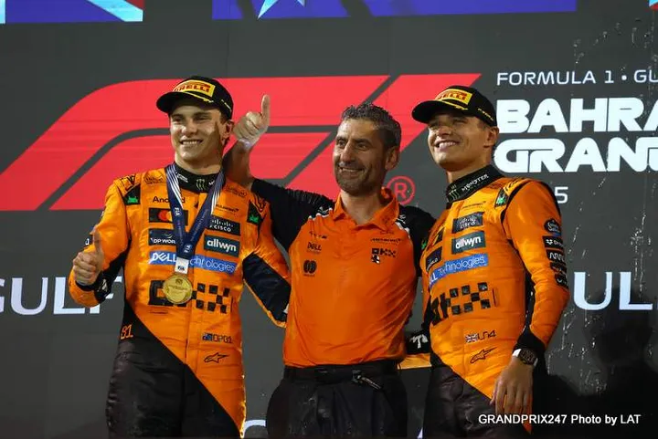 BAHRAIN, BAHRAIN - APRIL 13: Race winner Oscar Piastri of Australia and McLaren Andrea Stella, Team Principal of McLaren and Third placed Lando Norris of Great Britain and McLaren on the podium during the F1 Grand Prix of Bahrain at Bahrain International Circuit on April 13, 2025 in Bahrain, Bahrain. (Photo by Sam Bloxham/LAT Images)