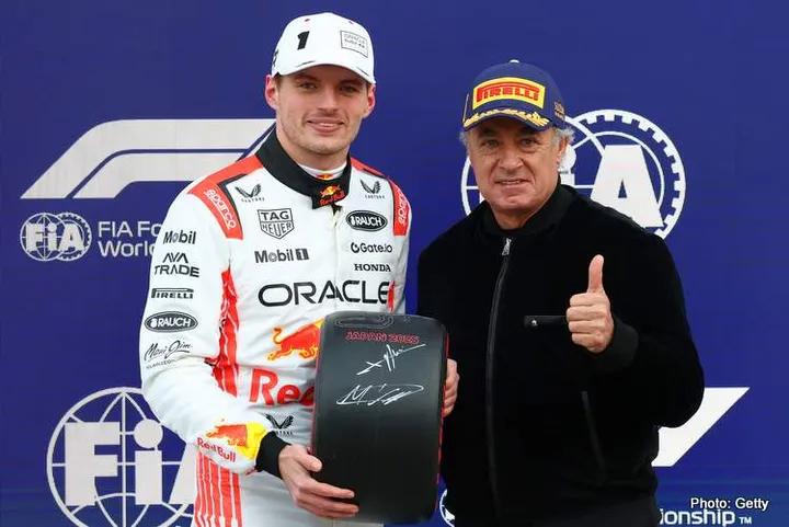 SUZUKA, JAPAN - APRIL 05: Pole position qualifier Max Verstappen of the Netherlands and Oracle Red Bull Racing receives his Pirelli Pole Position Award from former racer Jean Alesi during qualifying ahead of the F1 Grand Prix of Japan at Suzuka Circuit on April 05, 2025 in Suzuka, Japan. (Photo by Clive Rose/Getty Images) // Getty Images / Red Bull Content Pool // SI202504050182 // Usage for editorial use only //