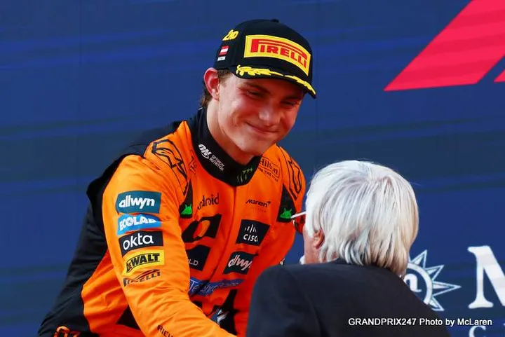 SPIELBERG, AUSTRIA - JUNE 29: Second placed Oscar Piastri of Australia and McLaren is congratulated on the podium by Bernie Ecclestone during the F1 Grand Prix of Austria at Red Bull Ring on June 29, 2025 in Spielberg, Austria. (Photo by Joe Portlock/Getty Images)