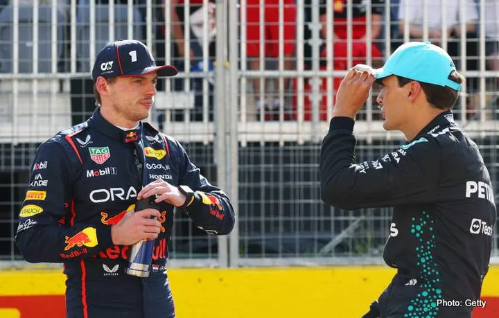 MONTREAL, QUEBEC - JUNE 14: Pole position qualifier George Russell of Great Britain and Mercedes AMG Petronas F1 Team talks with Second placed qualifier Max Verstappen of the Netherlands and Oracle Red Bull Racing in parc ferme during qualifying ahead of the F1 Grand Prix of Canada at Circuit Gilles-Villeneuve on June 14, 2025 in Montreal, Quebec. (Photo by Mark Thompson/Getty Images) // Getty Images / Red Bull Content Pool // SI202506140641 // Usage for editorial use only //