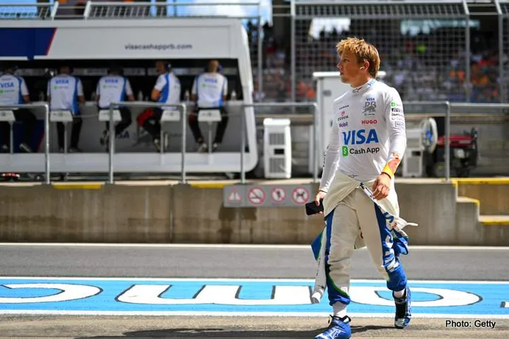 SPIELBERG, AUSTRIA - JUNE 28: Liam Lawson of New Zealand and Visa Cash App Racing Bulls walks in the Pitlane during qualifying ahead of the F1 Grand Prix of Austria at Red Bull Ring on June 28, 2025 in Spielberg, Austria. (Photo by Rudy Carezzevoli/Getty Images) // Getty Images / Red Bull Content Pool // SI202506280399 // Usage for editorial use only //