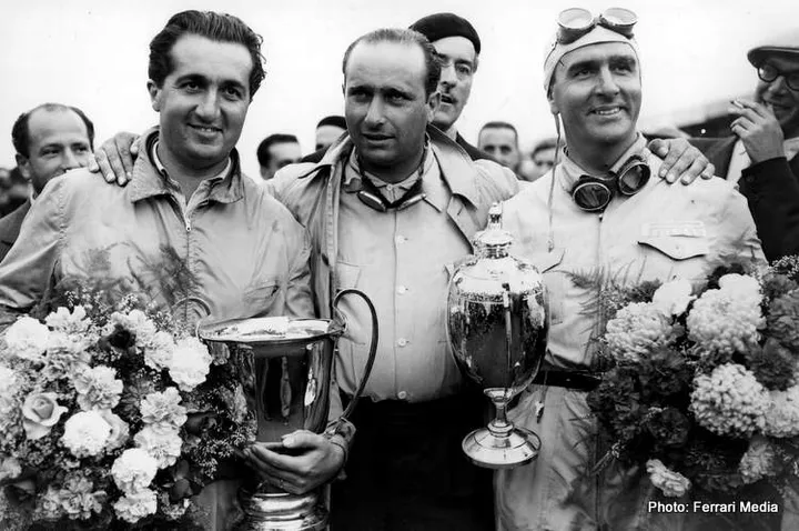28th August 1950: Racing drivers (left to right) Alberto Ascari (1918 - 1955) of Italy, Juan Manuel Fangio of Argentina and Giuseppe Farina of Italy, who won the Grand Prix at Silverstone. (Photo by Central Press/Getty Images)