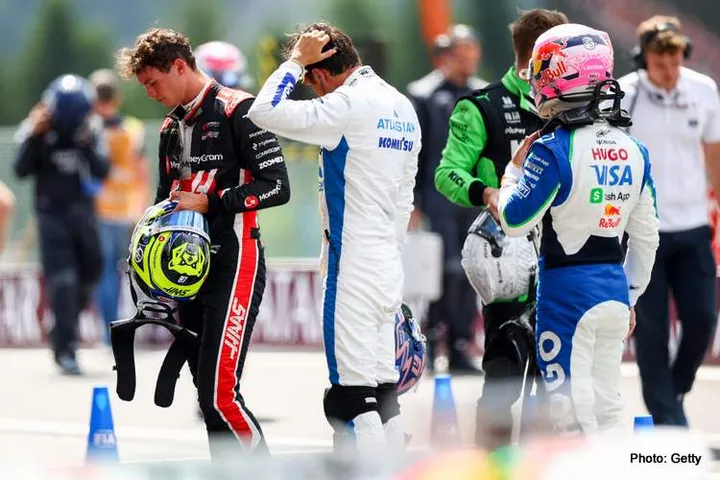 SPA, BELGIUM - JULY 26: Oliver Bearman Of Great Britain and Haas, Alexander Albon of Great Britain and Williams and Liam Lawson of New Zealand and Visa Cash App Racing Bulls VCARB being weighed during the Sprint Race ahead of the F1 Grand Prix of Belgium at Circuit de Spa-Francorchamps on July 26, 2025 in Spa, Belgium. (Photo by Peter Fox/LAT Images) // Getty Images / Red Bull Content Pool // SI202507261638 // Usage for editorial use only //