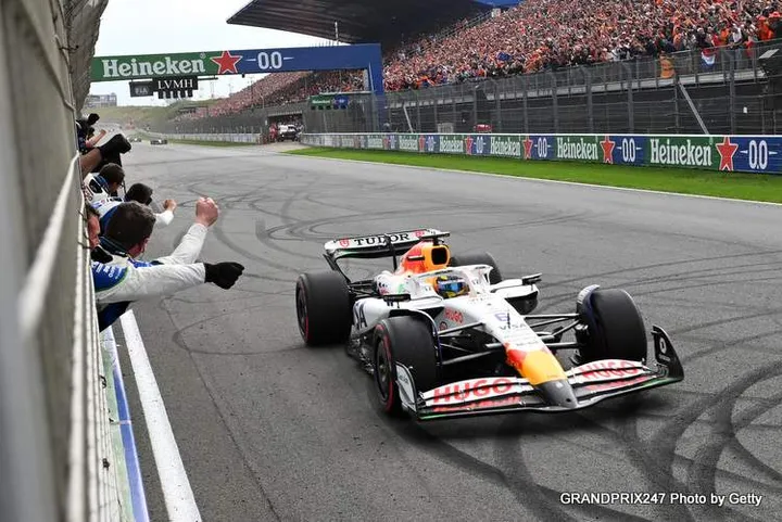 ZANDVOORT, NETHERLANDS - AUGUST 31: Third placed Isack Hadjar of France driving the (6) Visa Cash App Racing Bulls VCARB 02 crosses the line during the F1 Grand Prix of Netherlands at Circuit Zandvoort on August 31, 2025 in Zandvoort, Netherlands. (Photo by Rudy Carezzevoli/Getty Images) // Getty Images / Red Bull Content Pool // SI202508310708 // Usage for editorial use only //