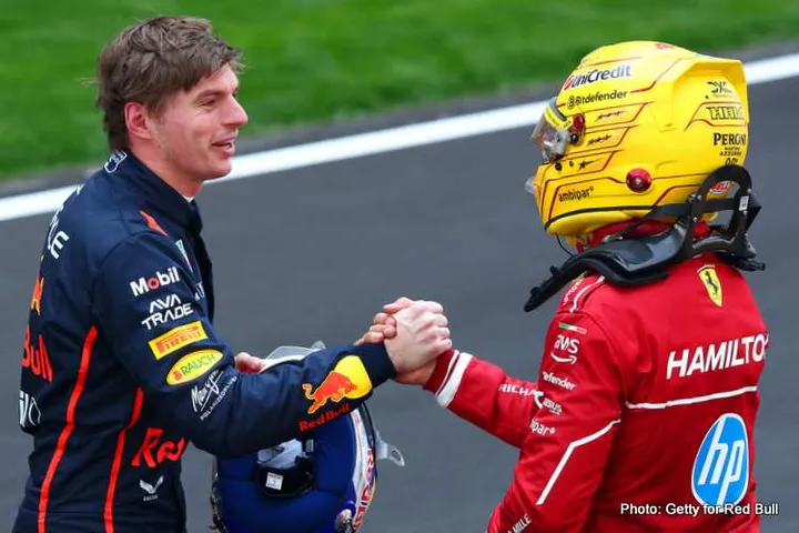 SHANGHAI, CHINA - MARCH 22: Third placed Max Verstappen of the Netherlands and Oracle Red Bull Racing congratulates Sprint winner Lewis Hamilton of Great Britain and Scuderia Ferrari in parc ferme during the Sprint ahead of the F1 Grand Prix of China at Shanghai International Circuit on March 22, 2025 in Shanghai, China. (Photo by Clive Rose/Getty Images) // Getty Images / Red Bull Content Pool // SI202503220056 // Usage for editorial use only //